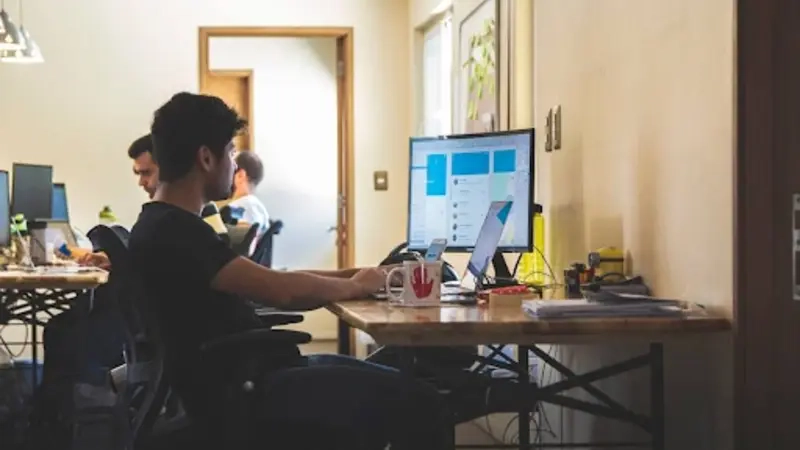 A male professional efficiently using top-request for proposal software with streamlined workflow and collaboration tools