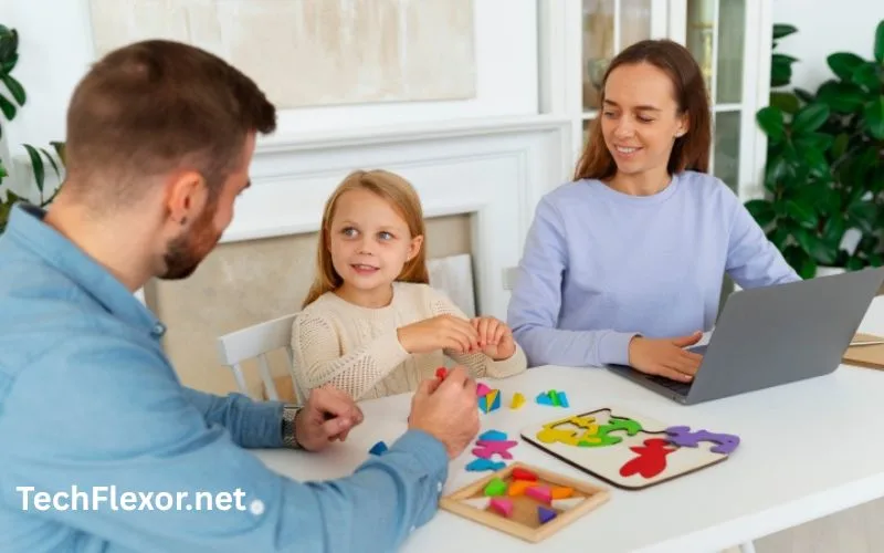 Parent relationship moment with mother and father engaging a child in learning activity at home